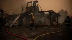 France orders evacuation of peninsula as hundreds flee wildfires by boat